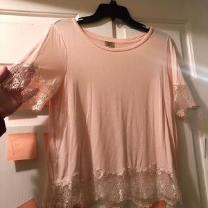 A light pink true craft brand shirt